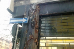 facciata-condominio-prima-del-ripristino-con-lamiere-e-serrande-nuove